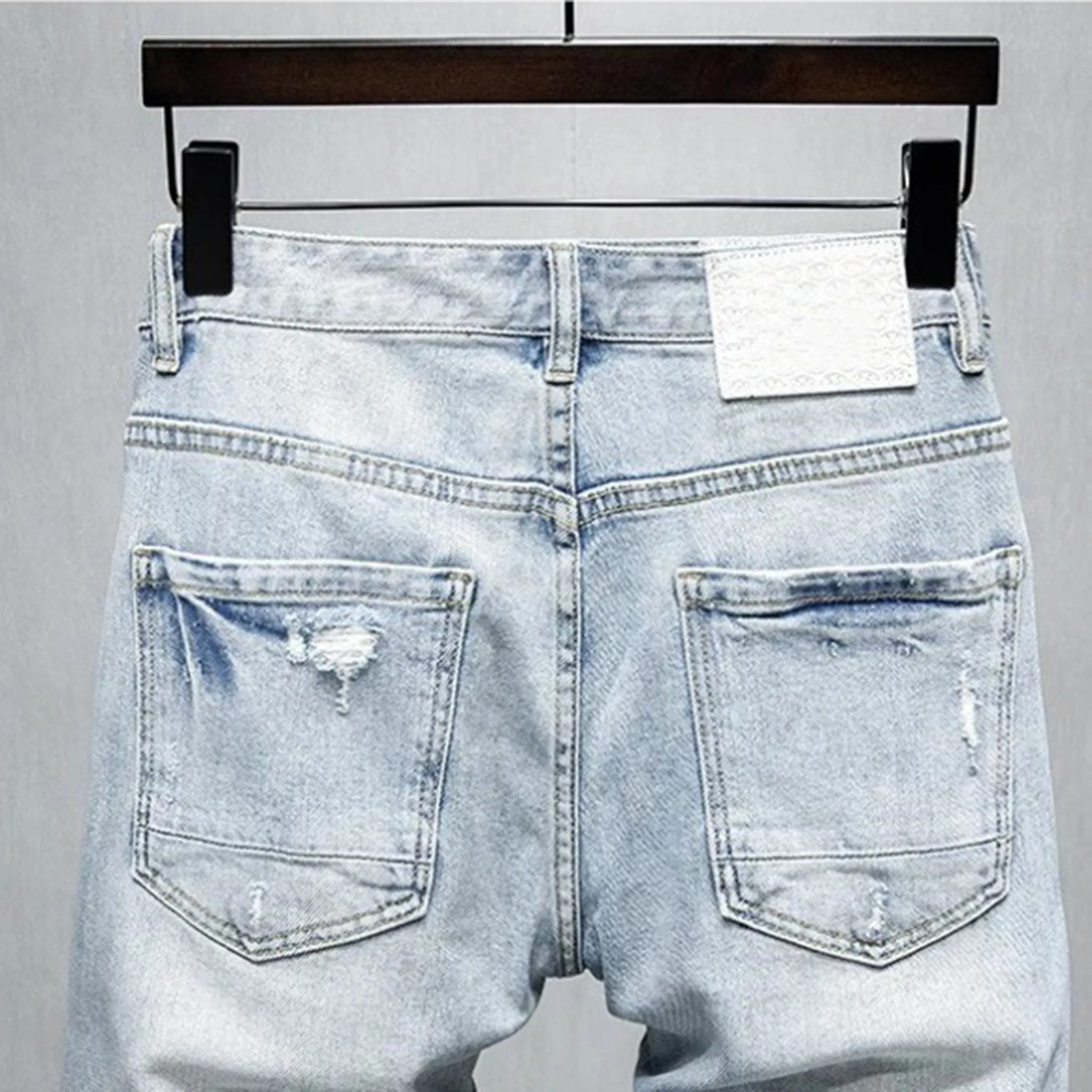 Distress-washed Light blue denim shorts for men