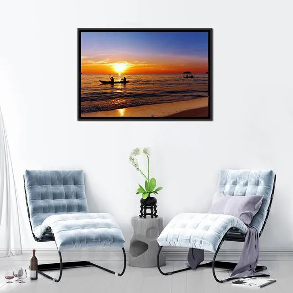 Kayakers At Sunset Canvas Wall Art