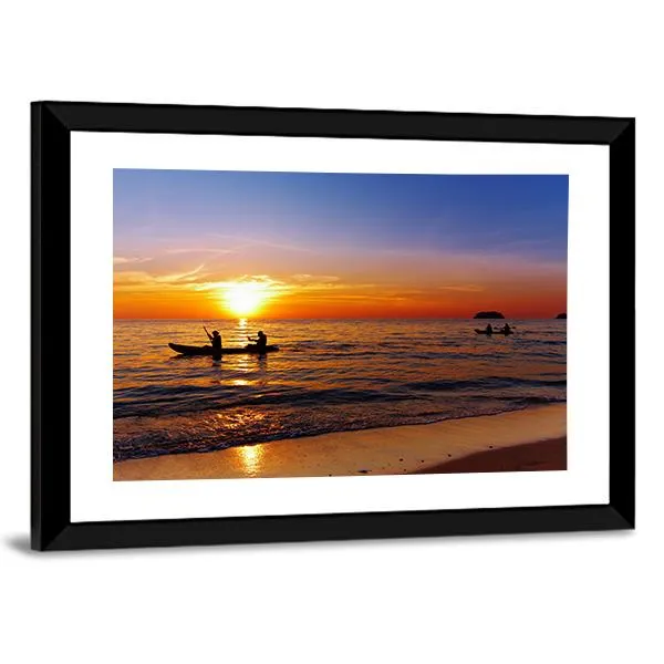 Kayakers At Sunset Canvas Wall Art