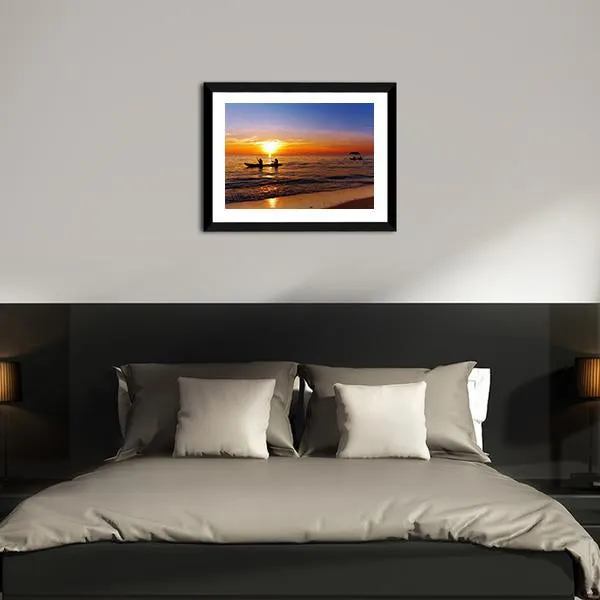 Kayakers At Sunset Canvas Wall Art