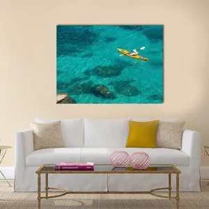 Kayaking In Green Water Canvas Wall Art